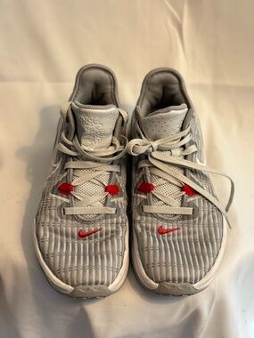 Nike Gray Athletic Sneakers with Red Accents